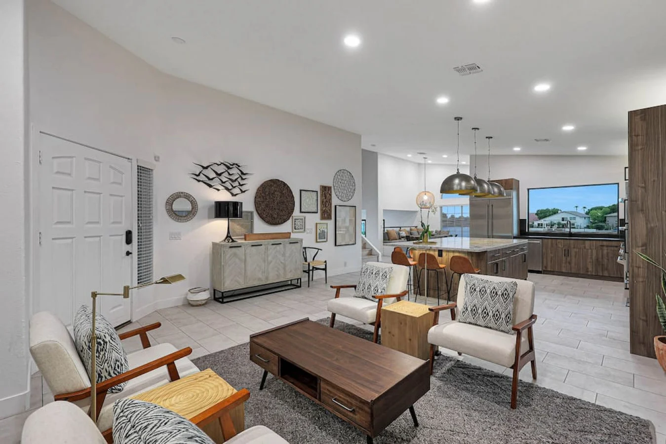 Welcome to Villa del Sol by Sunkasa, a refined lakefront sanctuary where resort-style amenities, breathtaking views, and thoughtful design come together for unforgettable stays. Located in the prestigious Arrowhead Lakes community, this luxury retreat is ideal for family gatherings, Spring Training trips, concert weekends, and intimate celebrations that deserve a beautiful setting.