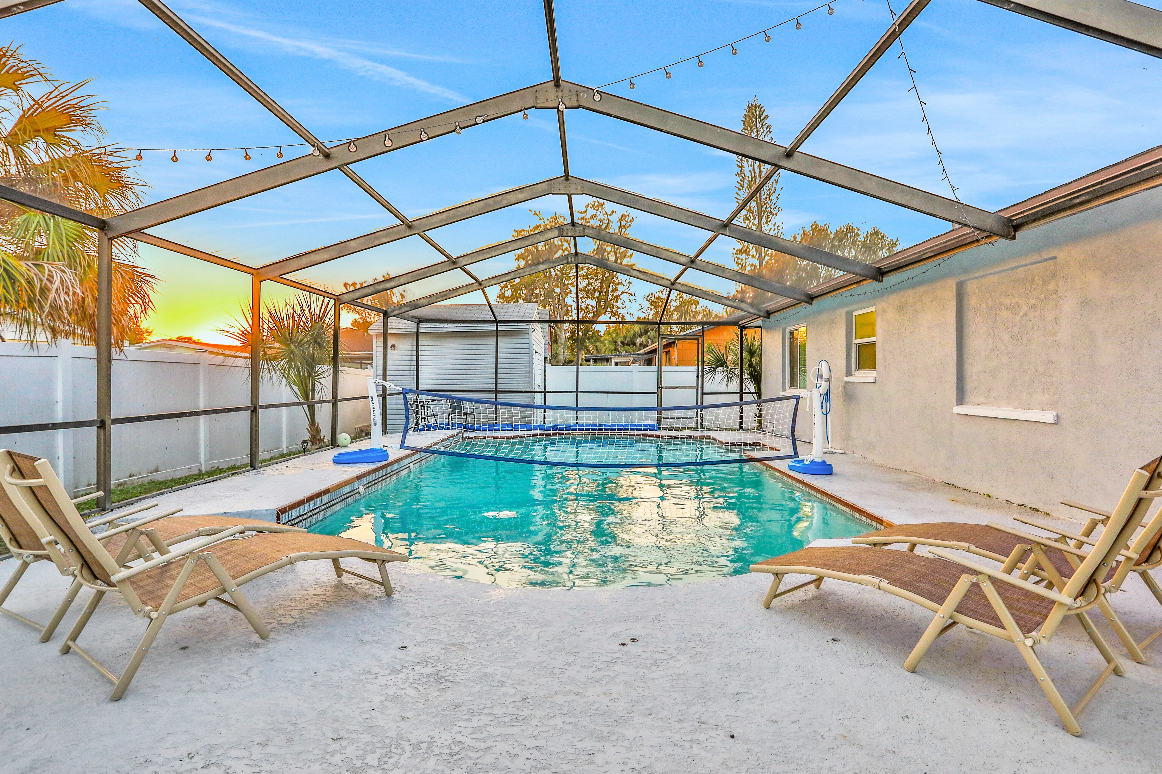 Dog friendly tropical stay with a private pool grill game tables and central AC